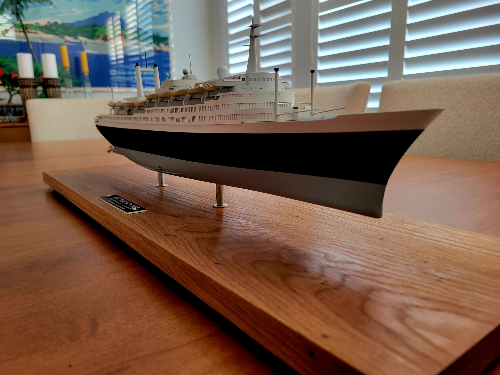 Starboard view of Onno Heesbeen’s 1:400 SS Rotterdam V scale model, showcasing its detailed blue hull and deck