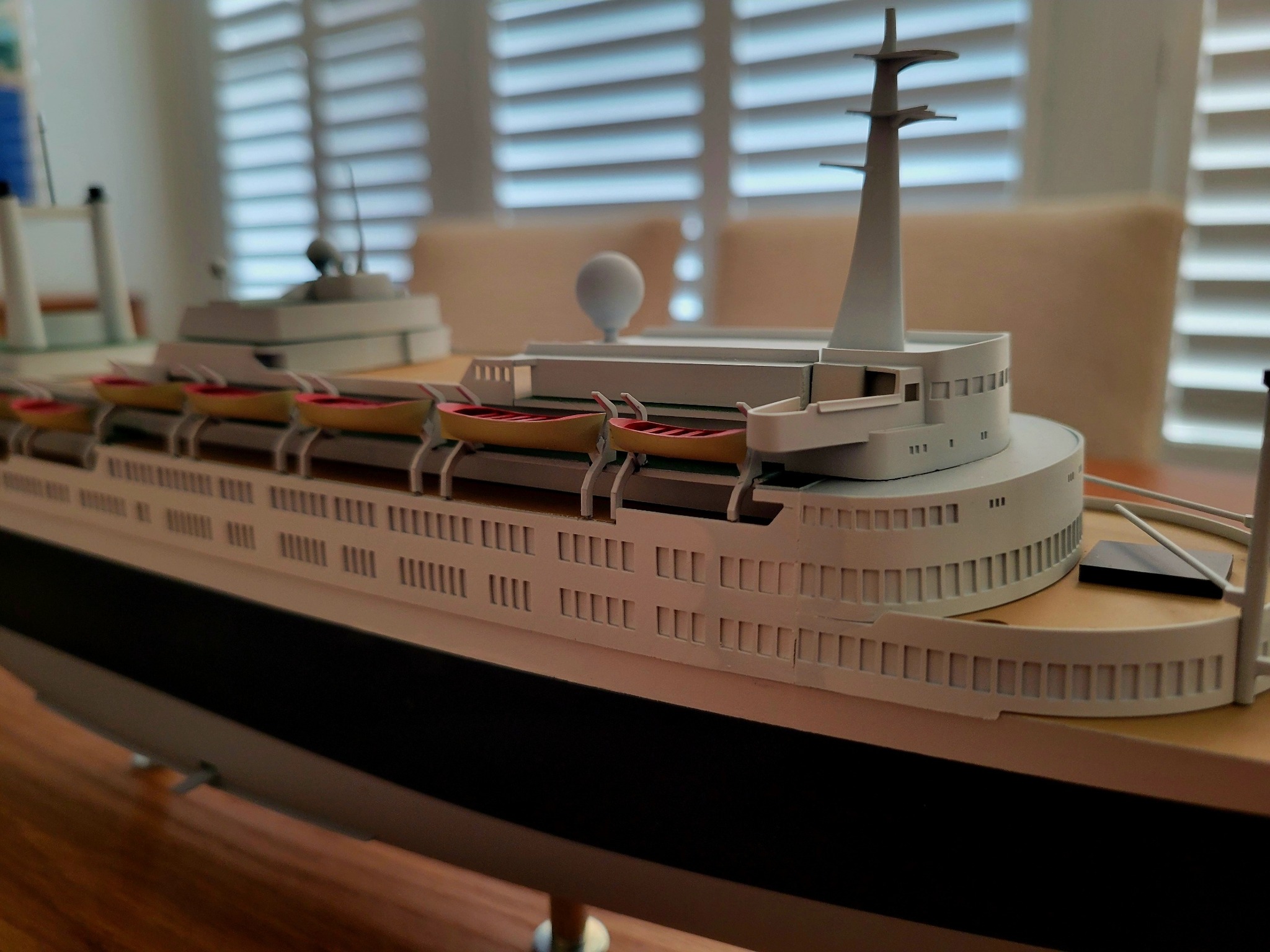 Close-up of the bridge and lifeboats on Onno Heesbeen’s SS Rotterdam V scale model, showing intricate details